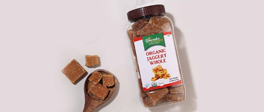 Organic Jaggery whole in bottle and 5 pisces on floor