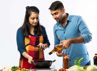 Couple cooking Indian food
