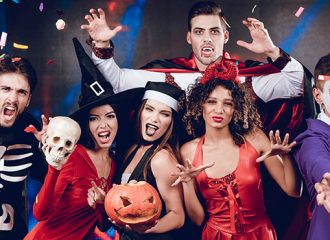6 people dressed in scary costumes in an Halloween party