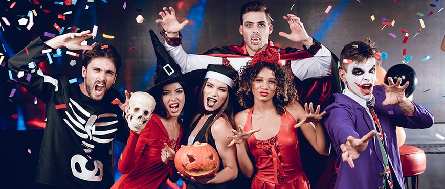 6 people dressed in scary costumes in an Halloween party