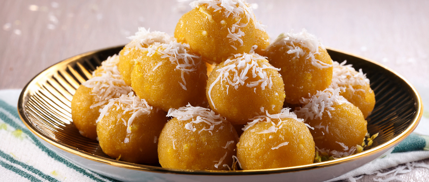 Prepare a Delicious Raksha Bandhan Feast for your Siblings with an Organic Touch 5 Besan Coconut Ladoo
